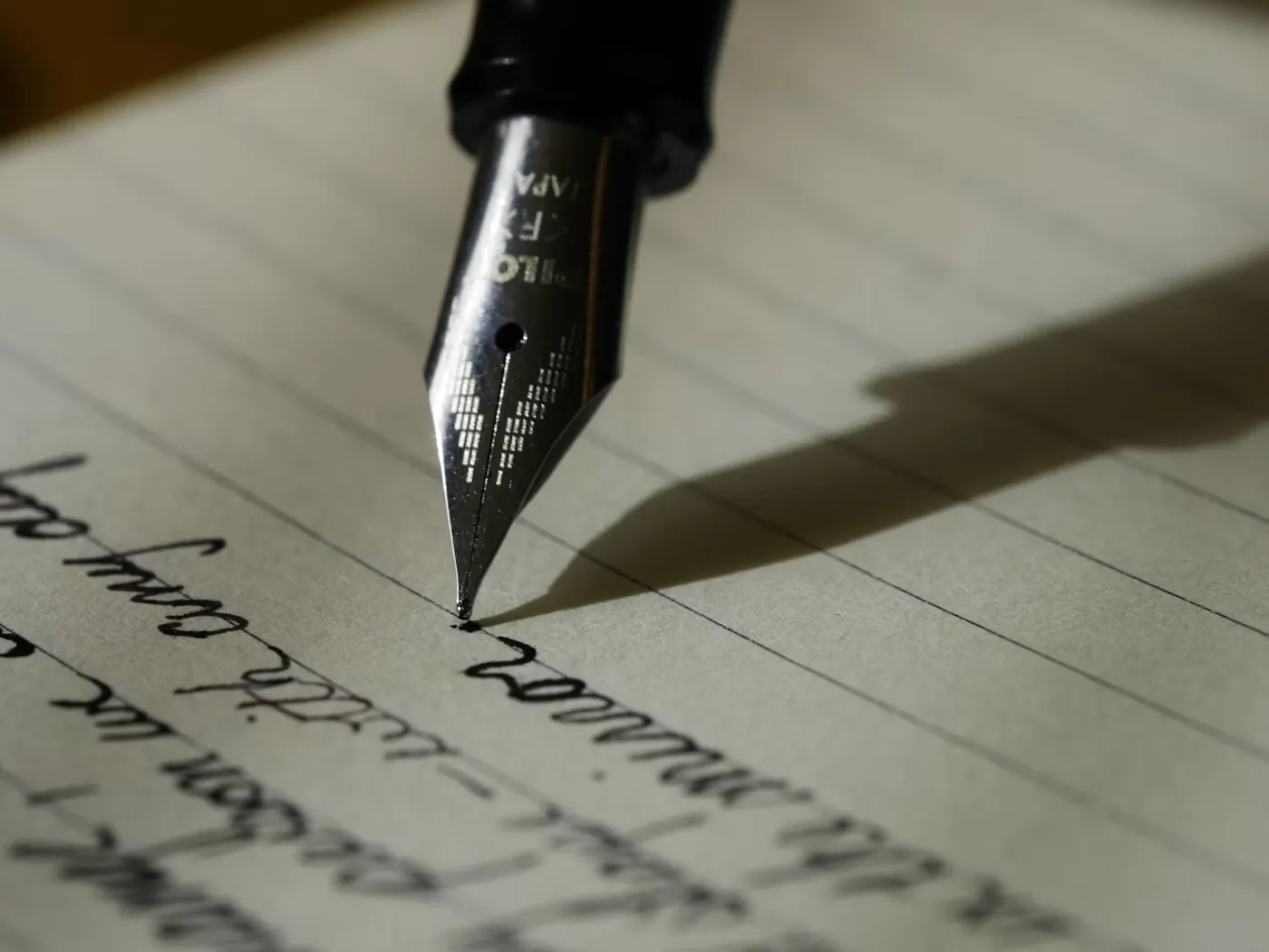 Writer drafting words by hand
